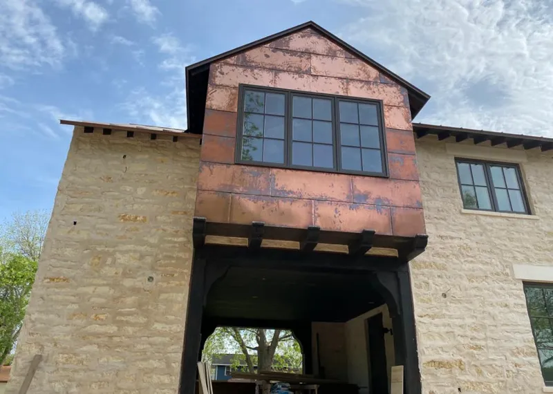Copper metal panel facade on a stone building for Skylight Installation in Palos Verdes Estates